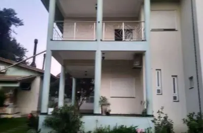 Casa com 3 quartos à venda na Rua José Pereira da Cunha, 59, Vila Nova, Porto Alegre