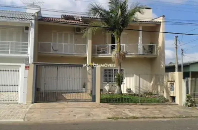 Sobrado com 4 dormitórios à venda, 240 m² por R$ 692.000,00 - Pinheiro - São Leopoldo/RS