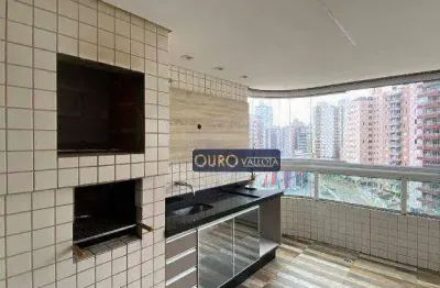 Apartamento na praia grande com varanda gourmet, 4 dormitórios e há 30 metros da praia.