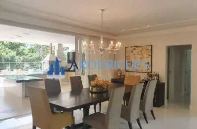Luxuosa mansão de 5 quartos e 5 suítes no alphaville i em salvador-ba: 1.050m², 3 salas, 7 banheiros e 8 vagas de garagem!