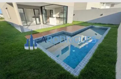 Venda de luxuosa casa em condomínio com 4 quartos e 4 suítes na vila de abrantes, camaçari-ba!