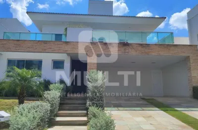Casa em condomínio fechado com 4 quartos para alugar no Jardins Roma, Uberlândia 