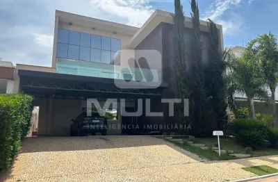 Casa em condomínio fechado com 6 quartos para alugar no Jardins Gênova, Uberlândia 