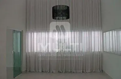 Casa em condomínio fechado com 3 quartos para alugar no Jardins Barcelona, Uberlândia 