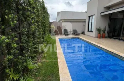 Casa em condomínio fechado com 4 quartos à venda no Buritis, Uberlândia 