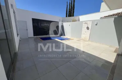 Casa em condomínio fechado com 3 quartos para alugar no Jardins Barcelona, Uberlândia 