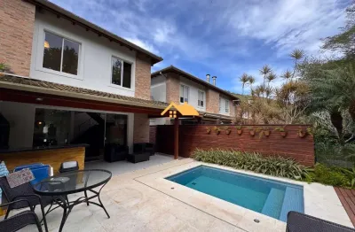 Casa com piscina em condomínio à venda em praia de pauba-são sebastião-sp, com 4 quartos, 4 suítes e 156m² de área, no bairro paúba. aproveite!
