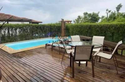 Casa 5 suítes condomínio pé na areia na marina armação de búzios