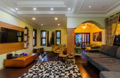 Espetacular casa em condomínio para venda com 4 quartos, sendo 4 suítes, 557m²