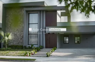 Linda casa térrea nova e com uma belíssima fachada, 4 suítes com closet, sala com pé direito duplo e piso em madeira maciça, piscina com spa toda mobiliada e decorada.