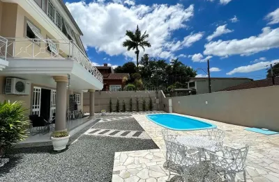 Casa em condomínio fechado com 5 quartos à venda no Glória, Joinville 