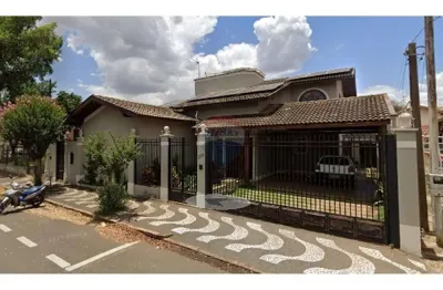 Casa para venda em centro de 339.00m² com 4 quartos, 4 suites e 4 garagens