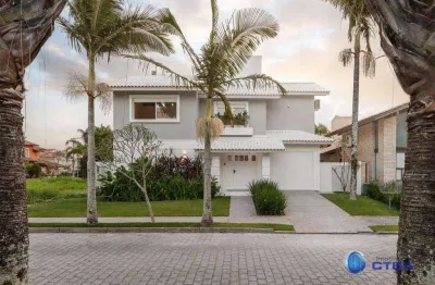 Casa para venda em jurerê de 350.00m² com 5 quartos, 5 suites e 2 garagens