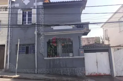 Sobrado para venda em centro de 127.00m² com 3 quartos e 2 garagens