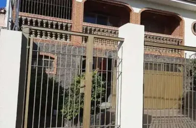 Sobrado para venda em centro de 440.00m² com 3 quartos, 1 suite e 4 garagens