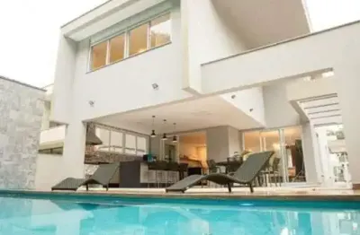 Casa para venda em riviera de 323.00m² com 5 quartos, 5 suites e 2 garagens