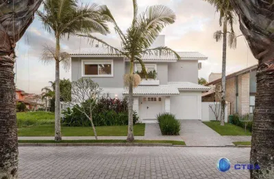 Casa para venda em jurerê de 350.00m² com 5 quartos, 5 suites e 2 garagens
