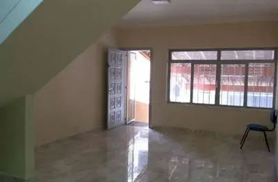 Sobrado para venda em centro de 109.00m² com 2 quartos e 2 garagens