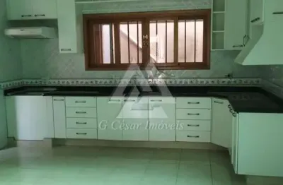 Sobrado para venda em centro de 321.00m² com 2 quartos, 2 suites e 2 garagens