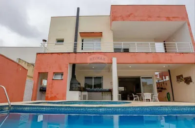 Casa de condomínio para venda em jardim ibiti do paço de 358.50m² com 5 quartos, 4 suites e 4 garagens