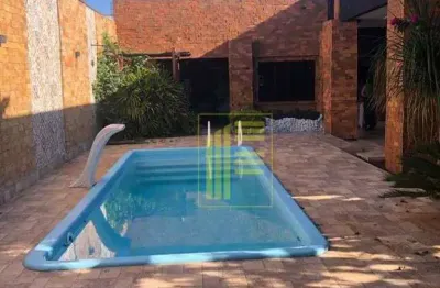 Casa para venda em centro de 170.00m² com 2 quartos, 1 suite e 4 garagens