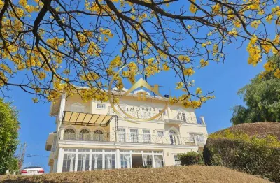 Casa de condomínio para venda em pinheiro de 560.00m² com 4 quartos, 4 suites e 6 garagens