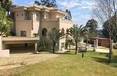 Casa para venda em tamboré 1 de 1060.00m² com 4 quartos, 4 suites e 8 garagens