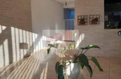 Sobrado para venda em centro de 125.00m² com 3 quartos, 1 suite e 2 garagens
