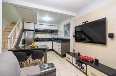 Sobrado para venda em estados de 65.00m² com 2 quartos e 2 garagens