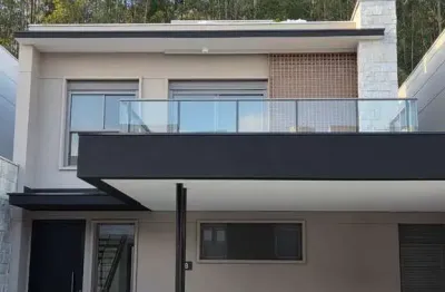 Casa para venda em condomínio singular de 310.00m² com 4 quartos, 4 suites e 2 garagens