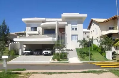 Casa para venda em alphaville dom pedro de 560.00m² com 4 quartos, 4 suites e 6 garagens