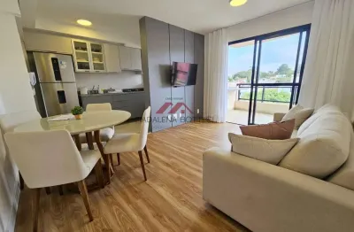 Apartamento para venda em centro de 62.00m² com 2 quartos, 1 suite e 2 garagens