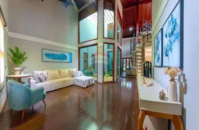 Casa para venda em centro de 339.00m² com 4 quartos, 4 suites e 4 garagens