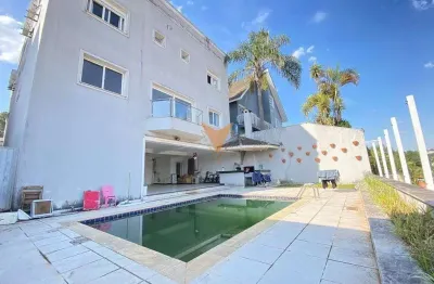 Casa para venda e aluguel em alphaville de 695.00m² com 5 quartos, 4 suites e 6 garagens