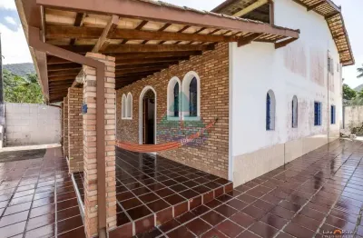 Casa para venda em praia da lagoinha - bairro de 248.00m² com 5 quartos, 3 suites e 3 garagens