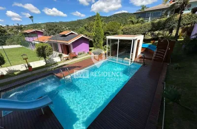 Casa para venda em capela do barreiro de 323.00m² com 5 quartos, 4 suites e 4 garagens