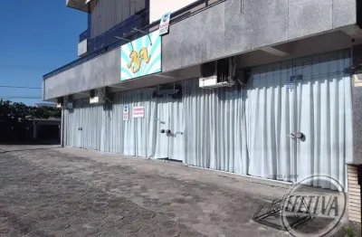 Prédio comercial para venda em guaratuba de 445.00m² com 4 garagens