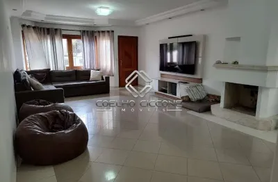 Sobrado para venda em Olímpico de 156.30m² com 3 Quartos, 3 Suites e 7 Garagens