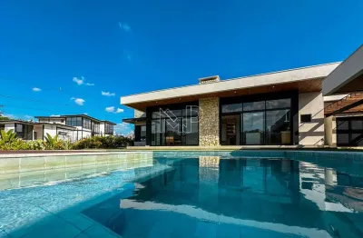 Casa de condomínio para venda em medeiros de 311.00m² com 4 quartos, 4 suites e 6 garagens