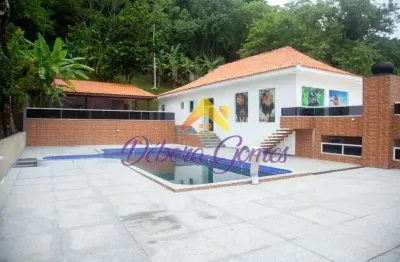 Casa para venda em canto do forte de 459.00m² com 5 quartos, 4 suites e 5 garagens