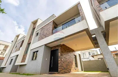 Sobrado para venda em boqueirão de 128.88m² com 3 quartos, 1 suite e 2 garagens