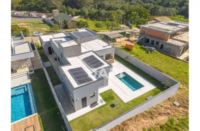 Casa de condomínio para venda em medeiros de 293.00m² com 4 quartos, 3 suites e 6 garagens