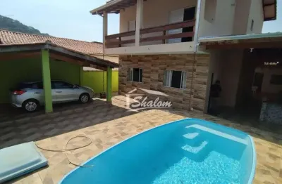 Sobrado para venda em Massaguaçu de 250.00m² com 4 Quartos, 3 Suites e 2 Garagens