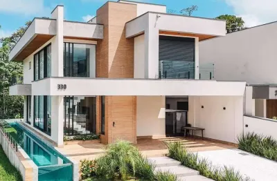 Casa para venda em Centro de 316.00m² com 5 Quartos, 4 Suites e 4 Garagens