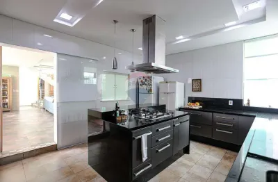 Casa para venda em Vila Lavínia de 393.62m² com 4 Quartos, 3 Suites e 10 Garagens