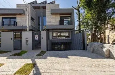 Sobrado para venda em Santa Felicidade de 295.00m² com 3 Quartos, 1 Suite e 4 Garagens