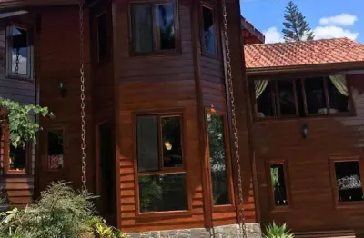 Casa de Condomínio para venda e aluguel em Cumbari de 400.00m² com 4 Quartos, 2 Suites e 2 Garagens