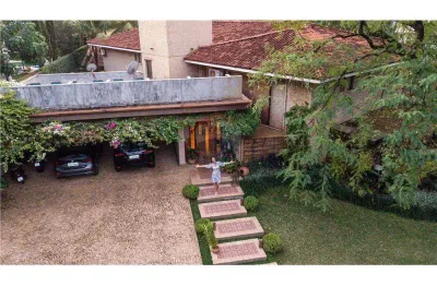 Casa para venda em Jardim América de 585.00m² com 4 Quartos, 4 Suites e 6 Garagens