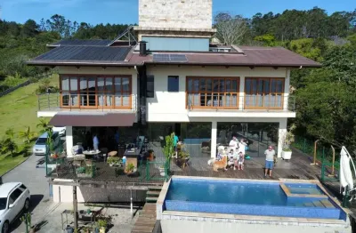Casa alto padrão à venda com possibilidade de locação. residência com 3 quartos sendo 3 suítes, 12 vagas, piscina, terreno com 6.000m², joão paulo, florianópolis - sc