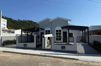 Venda: casa 3 quartos sendo 1 suíte, geminada, 1 vaga, 80m² privativos, biguaçu, sc - br